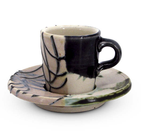1 HP Bloomer’s espresso cup, 5 in. (12.7 cm) in diameter, wheel-thrown porcelain, slip trailing, digitally-cut stencil glaze masking.