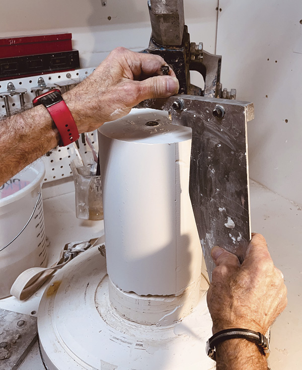 2 Once the plaster has set up enough to hold its shape, remove the flashing.