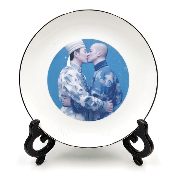 3 Adam Chau’s Generated Love, 8¼ in. (21 cm) in diameter, porcelain, AI-generated image, wood, 2023.