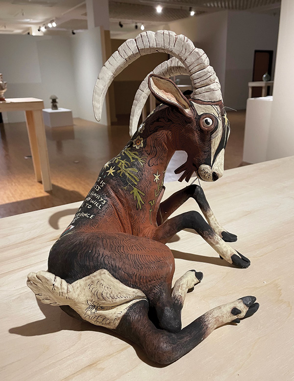 8 Julian Miholic’s We Have Always Survived (two views), stoneware, underglaze, glaze, fired to cone 51/2, nichrome wire.