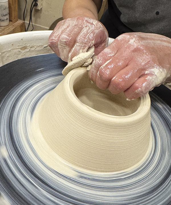 4 Form the walls into a volcano shape.