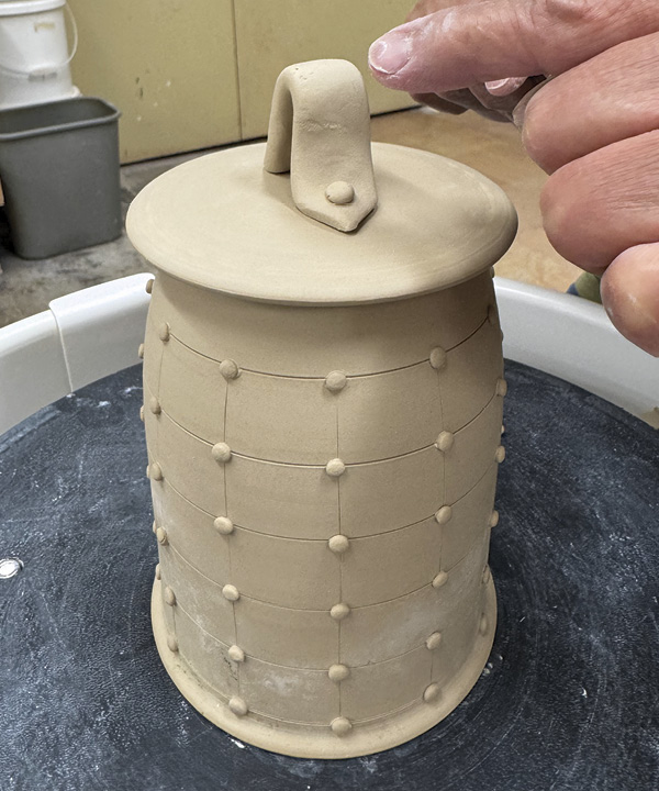 15 Attach a handle to lid.