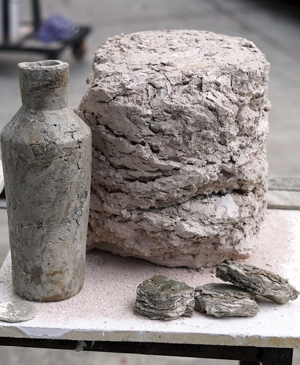 2 Claire Ellis’ dried and fired sink-sludge objects.