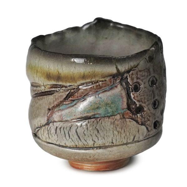 2 Gina Freuen’s Texture Cup, 4 in. (10 cm) in height, slab-built and altered porcelain, wood and soda fired to cone 10–12.
