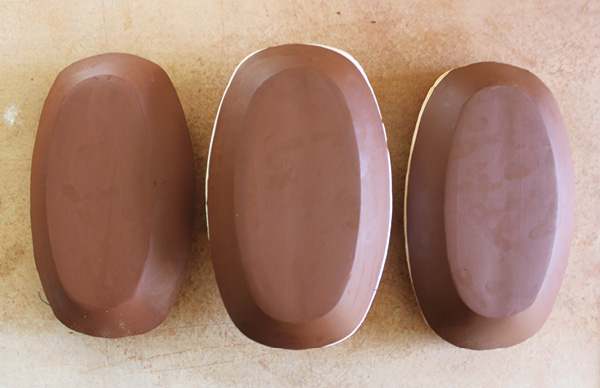 6 Three plates await feet on identical oval slump molds.