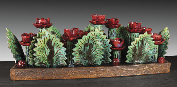 1 Eddie Dominguez’ 73-piece Rose Garden sculptural dinnerware set with 12 place settings, 5 ft. (1.5 m) in length, wheel-thrown and handbuilt terra cotta, carved, underglaze, glaze, low fired, leather and copper rectangular base. Museum purchase.