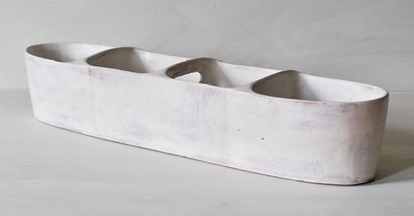 1 Maggie Jaszczak’s Small Partitioned Trough, 241/2 in. (62.2 cm) in length, earthenware, slip, glaze, 2023.