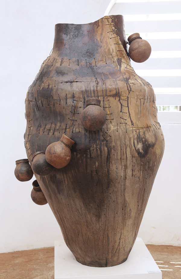 8 Frederick Ebenezer Okai's Obaapa II, 5 ft. 2 in. (1.6 m) in height, ceramic, metal wire, polyurethane, acacia plant dye, 2021.