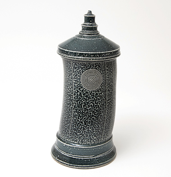 2 Walter Keeler's Serpentine Extruded Jar, 113/4 in. (30 cm) in height, stoneware, black stain, salt glaze, oil fired to cone 6–10, 2017. Photo: Goldmark Gallery.