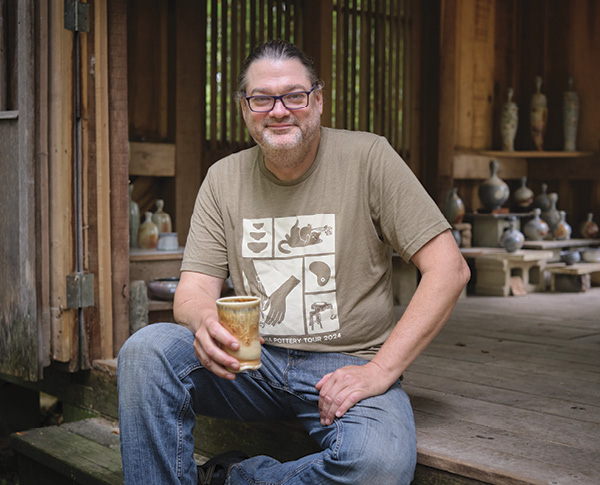 5 Mark Goertzen inside his Japanese tea hut during the 2024 Michiana Pottery Tour in Constantine, Michigan.