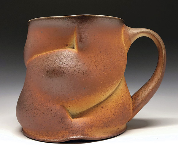 2 Ben Eberle's Hug Mug, 4½ in. (11.4 cm) in height, wheel-thrown and altered B-Mix clay, fired to cone 10 in a wood-soda kiln, 2023.
