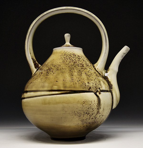 4 Ben Eberle's Amber teapot, 11 in. (27.9 cm) in height, wheel-thrown and textured porcelaneous stoneware, fired to cone 11 in a wood-soda kiln, 2025.
