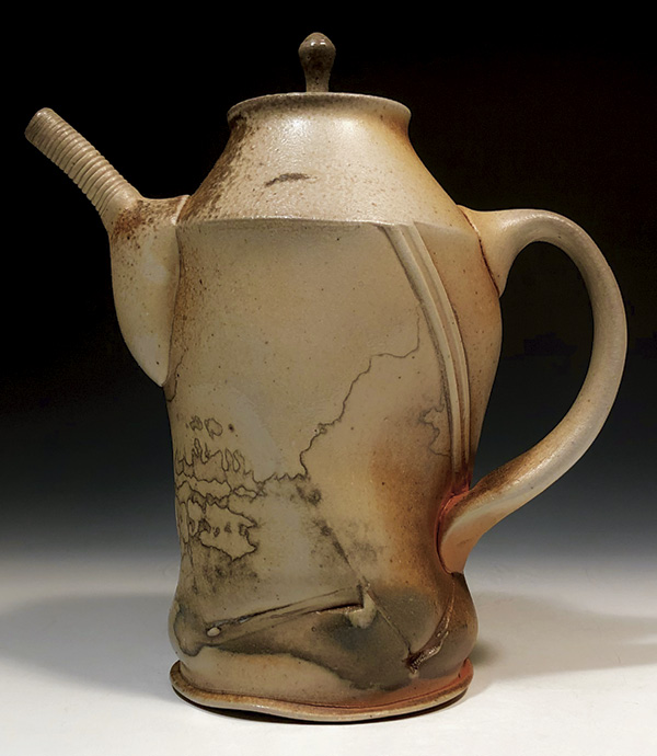 6 Ben Eberle's Teapot, 9 in. (22.9 cm) in height, wheel-thrown and altered B-Mix clay, fired to cone 10 in a wood-soda kiln, 2022.