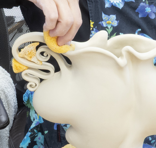 6 On a different piece, I have inserted pieces of sponge between the handles to maintain spacing while drying.