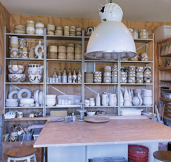 5 Shelves of bisqueware and finished work in Lemmens’ studio in Mill Valley, California.