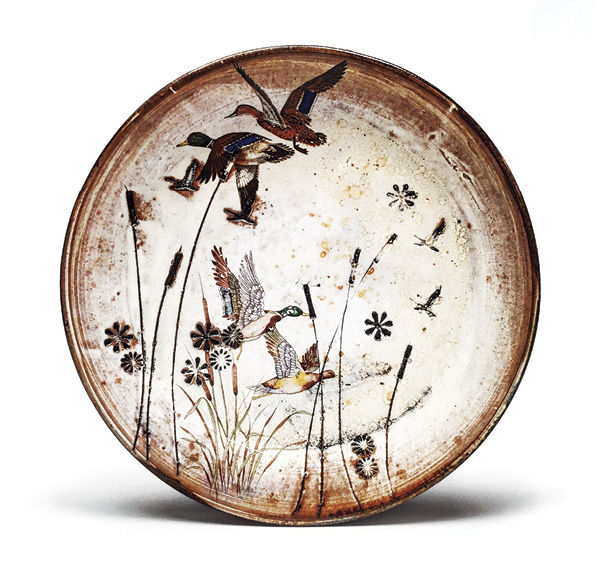 Justin Rothshank’s Swamp Dinner Plate, Standard Ceramic Supply’s 308 clay, wheel thrown, stamped, poured porcelain slip, stained with Amaco underglaze at bisque, soda fired to cone 3 in oxidation, decals fired to cone 015, 2018.