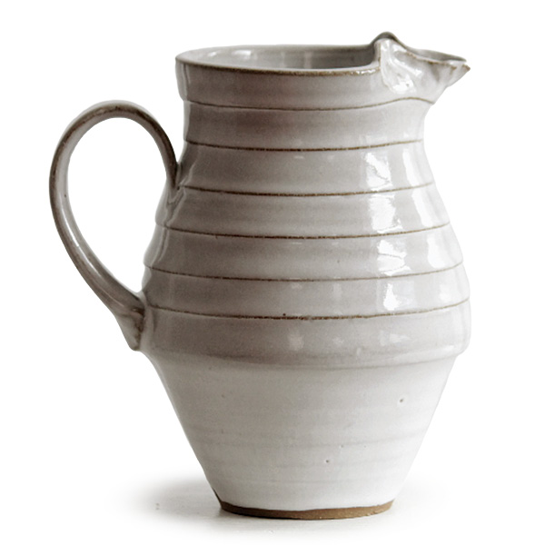 3 Camille Beckles’ Lemonade Pitcher, 9 in. (22.9 cm) in height, brown stoneware, gloss white glaze, fired to cone 6 in an electric kiln, 2024.