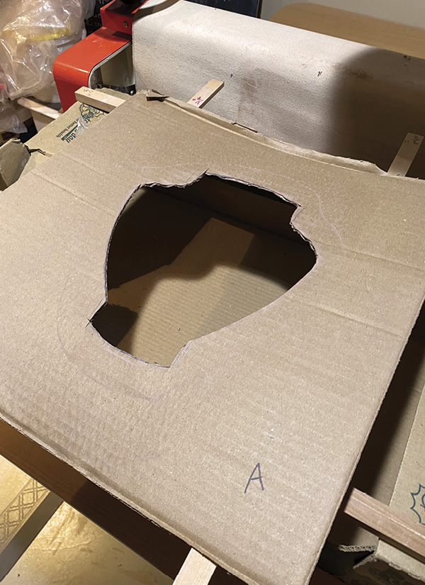 4 Place the cardboard template onto the supports to test the fit.