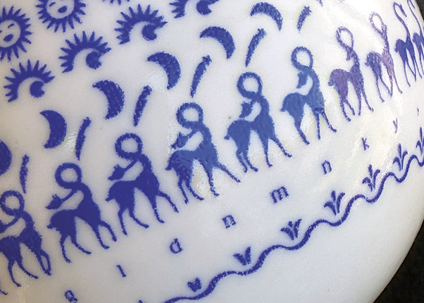 4 Detail of the glass enamel decal fused to the glazed surface.