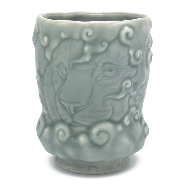 1 Tyler Quintin’s Cloud Tiger Yunomi, 4½ in. (11.4 cm) in height, porcelain, fired in reduction to cone 10, 2025.