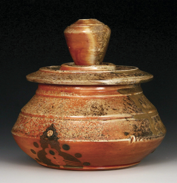 1 Molly Johnson’s jar, 7 in. (17.8 cm) in height, wood-fired porcelain, flashing slip, wood-ash melt.