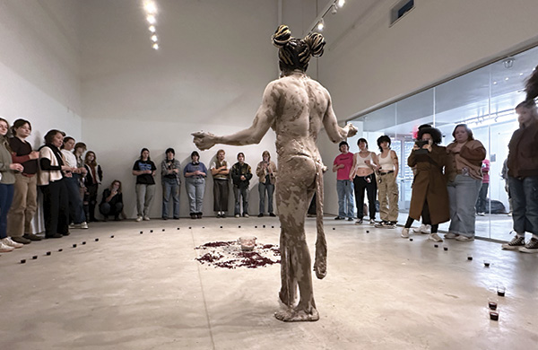 3 Small cups of sobolo, an African hibiscus-based tea, formed a perimeter around Fiatsi and the audience was invited to imbibe.