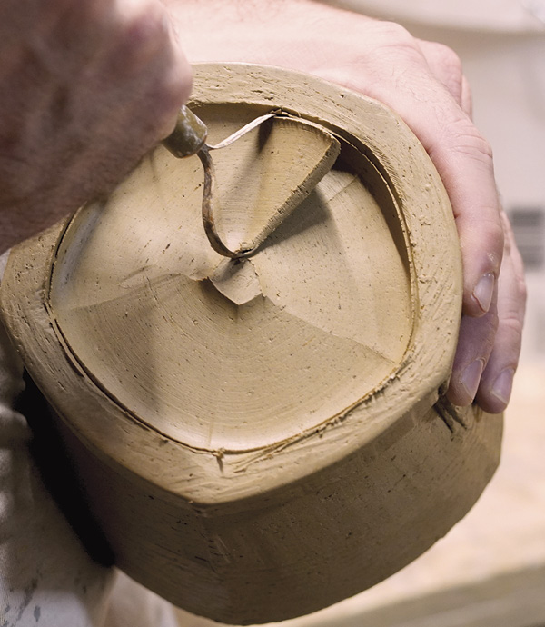 8 With a loop tool, hand trim the foot.