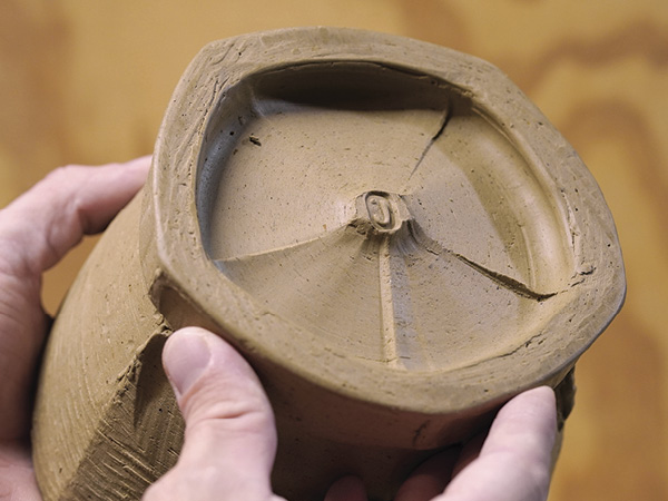 17 Once the teapot is assembled, add your signature or chop mark to the foot to finish.