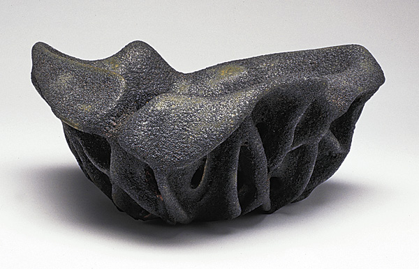 1 Bob Reed’s Offerings, 61/2 in. (17 cm) in height, handbuilt white stoneware, with Bob’s Blue-Black Crater Glaze, fired to cone 1.