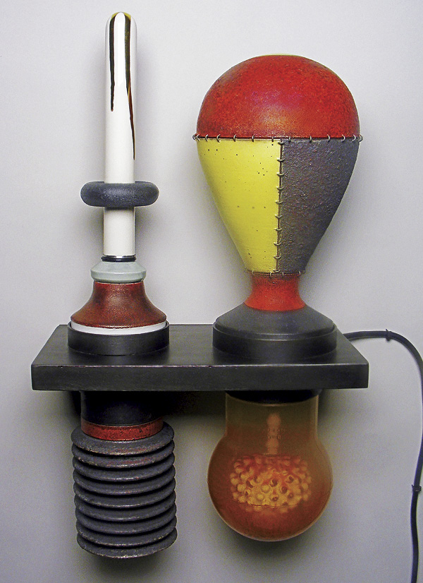 4 Matt Wilt’s Surrogate, 25 in. (64 cm) in length, stoneware, porcelain, multiple glazes (including Yellow Paint, Black Rubber, and Hot Lava), steel, glass. All pieces are fired to cone 9 in reduction and cooled in reduction.