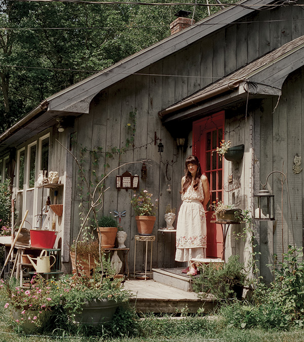 Dominique Ostuni in front of her studio in Bowdoinham, Maine