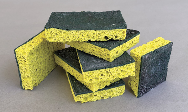 1 Chris Locke's Sponges, up to 5 in. (12.7 cm) in length, stained porcelain (green), crater glaze (yellow), fired to cone 6 in an electric kiln, cold processed with a saw, 2024.