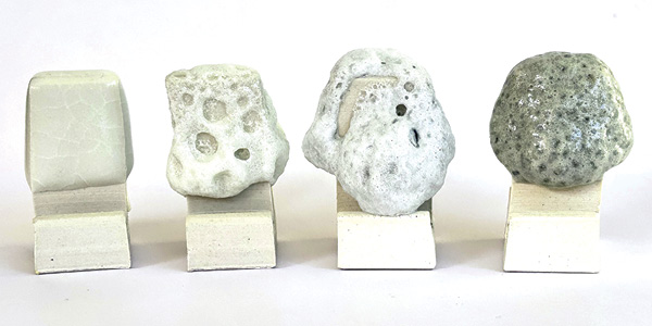 2 From left: Locke’s Residue base glaze, base glaze with MgSO₄, base glaze with MgSO₄ and silicon carbide, base glaze with silicon carbide. Fired to cone 6 in an electric kiln.
