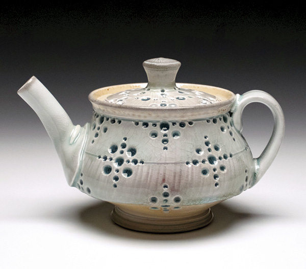5 Andrew McIntyre’s perforated teapot, 5¼ in. (13 cm) in height, wheel-thrown soda-fired porcelain, 2023.