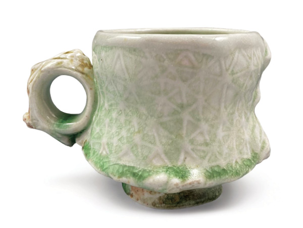 1 Tyler Quintin’s mug, 3½ in. (9 cm) in height, porcelain, wood/salt fired to cone 10, 2023.