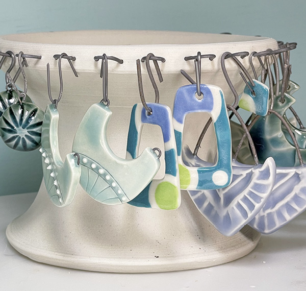 3 Create S-shaped hooks and hang your jewelry for glaze firing.