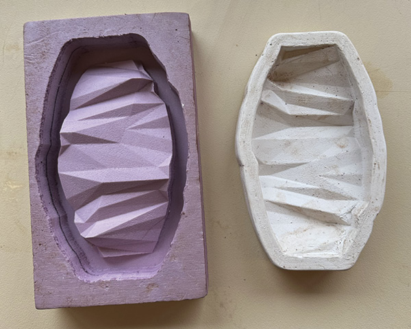 2 An example of a completed CNC-milled foam block (left) and the plaster mold that was cast into it (right).