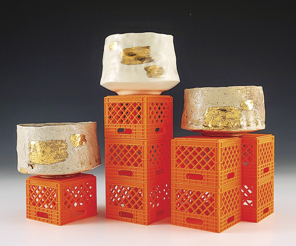 1 Marcè Nixon-Washington’s Orange Crate Teabowls, to 8 3/4 in. (22.2 cm) in height, stoneware, luster, 3D-printed milk crates, 2024. Photo: Companion Gallery.