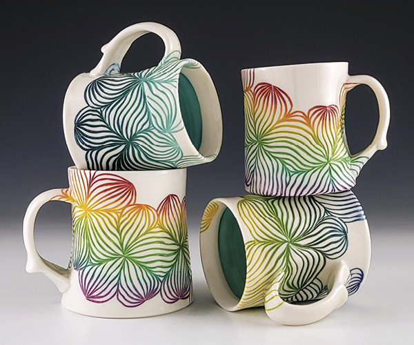 3 Kirsty Kash’s Carved Ombré Mugs, to 8 in. (20.3 cm) in height, cone-6 porcelain, carved, inlaid underglazes, 2024. Photo: Companion Gallery.