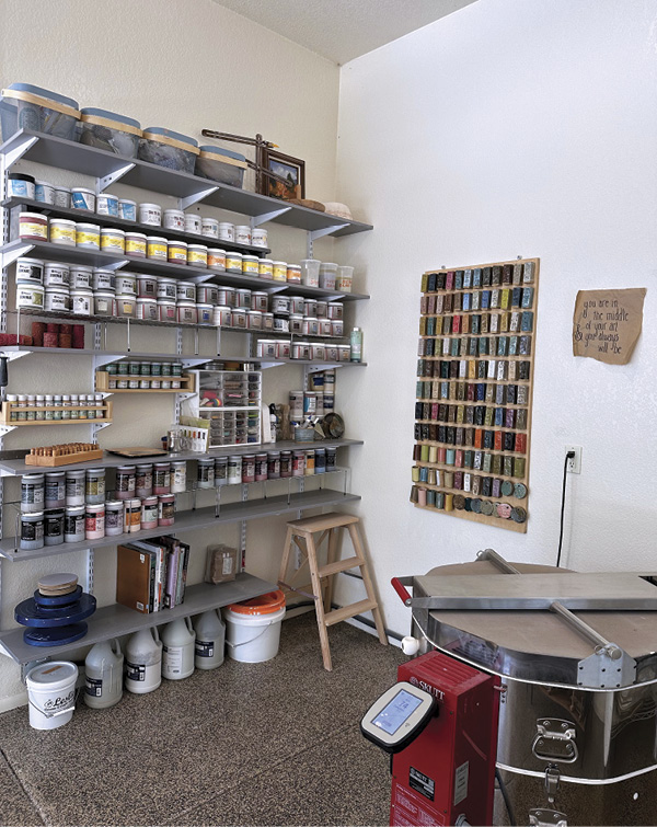 A glazing zone stores commercial glazes, test tiles, and larger tools.