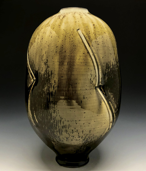 1 Ben Eberle’s Amber Rain Vessel, 14 in. (35.6 cm) in height, wheel-thrown and embossed porcelain, fired in a wood-soda kiln, 2024.