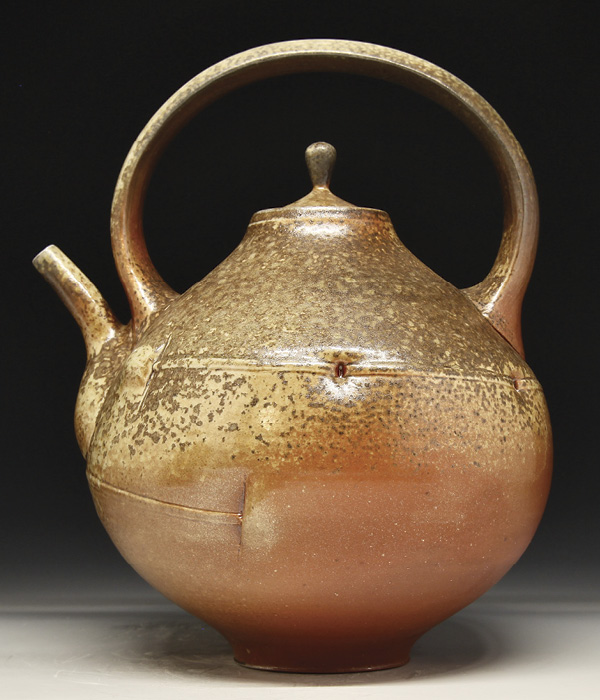 2 Ben Eberle’s teapot, 10 in. (25.4 cm) in height, wheel-thrown and embossed stoneware, fired in a wood-soda kiln, 2025.