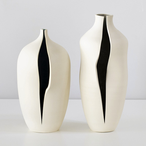 Benjamin Oswald's Cut Vessels, to 8 in. (20.3 cm) in height, porcelain, glaze, 2022.