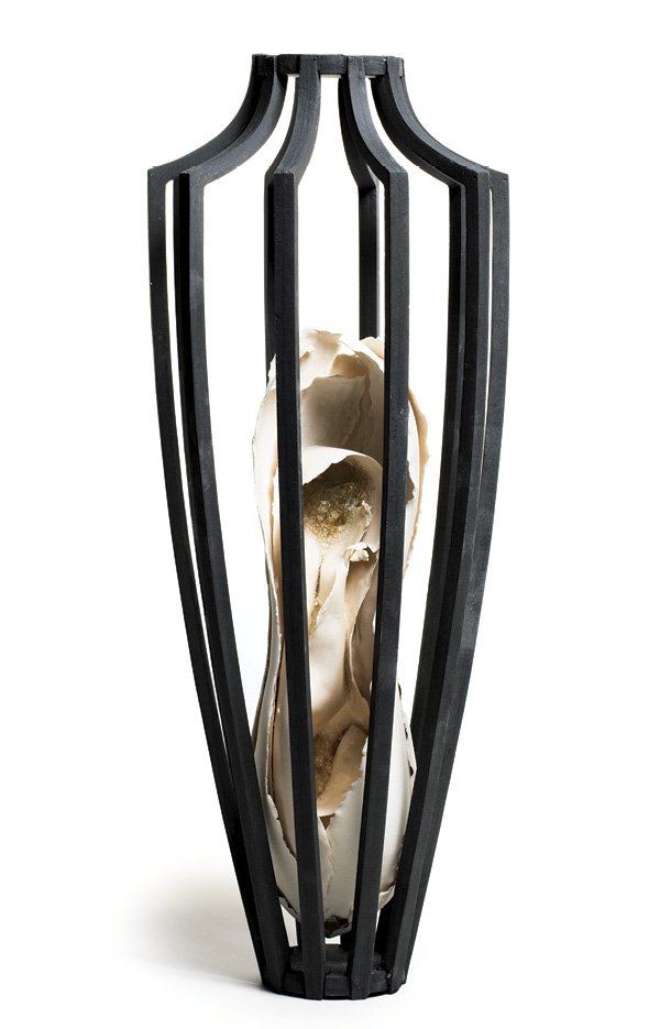 Benjamin Oswald's Fire Within the Ribs, 16 in. (40.6 cm) in height, black porcelain, glaze, glass, epoxy, 2025.
