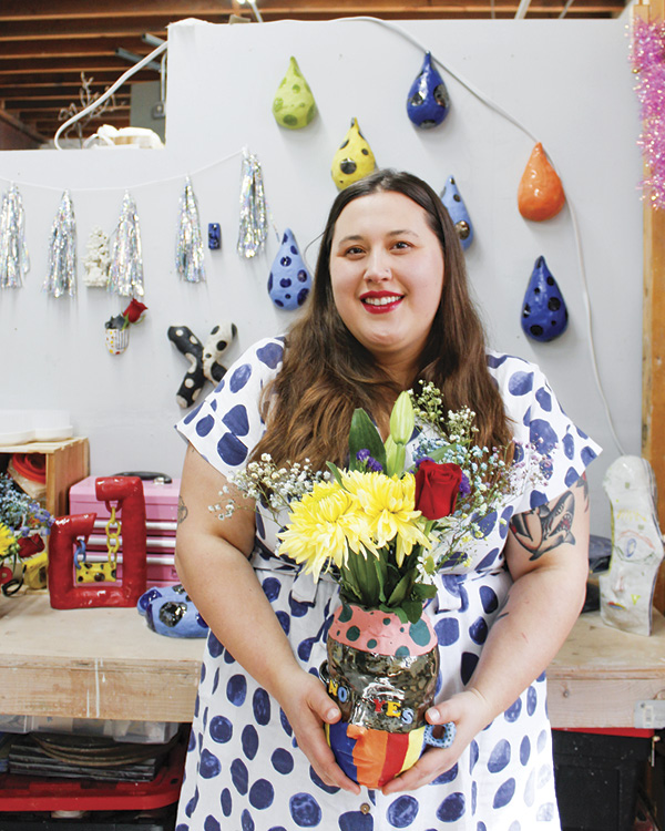 Hannah Kautto, Anonymous Artist Fellow, posing in her studio during her one-year residency. Northern Clay Center, Minneapolis, Minnesota.