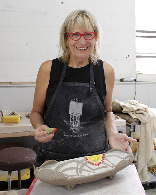 Suze Lindsay, McKnight Resident, working in her studio during her Summer 2025 residency. Northern Clay Center, Minneapolis, Minnesota.
