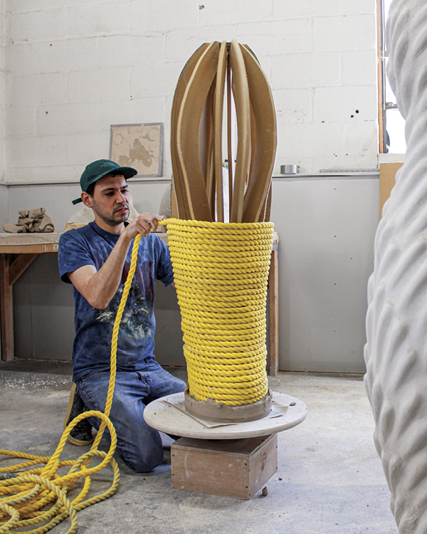 Uriel Caspi, McKnight Resident, working on a piece in his studio during his residency in Spring 2025. Northern Clay Center, Minneapolis, Minnesota.