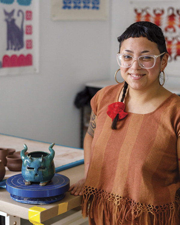 Gabo Martinez posing in her studio. Photo: Katy Anderson. Houston Center for Contemporary Craft, Houston, Texas.