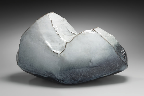 1 Kaneta Masanao’s Rock-like Vessel, 21¼ in. (54 cm) in length, stoneware, white Hagi glaze, 2023. Photo: Richard Goodbody. Courtesy of Joan B Mirviss LTD.