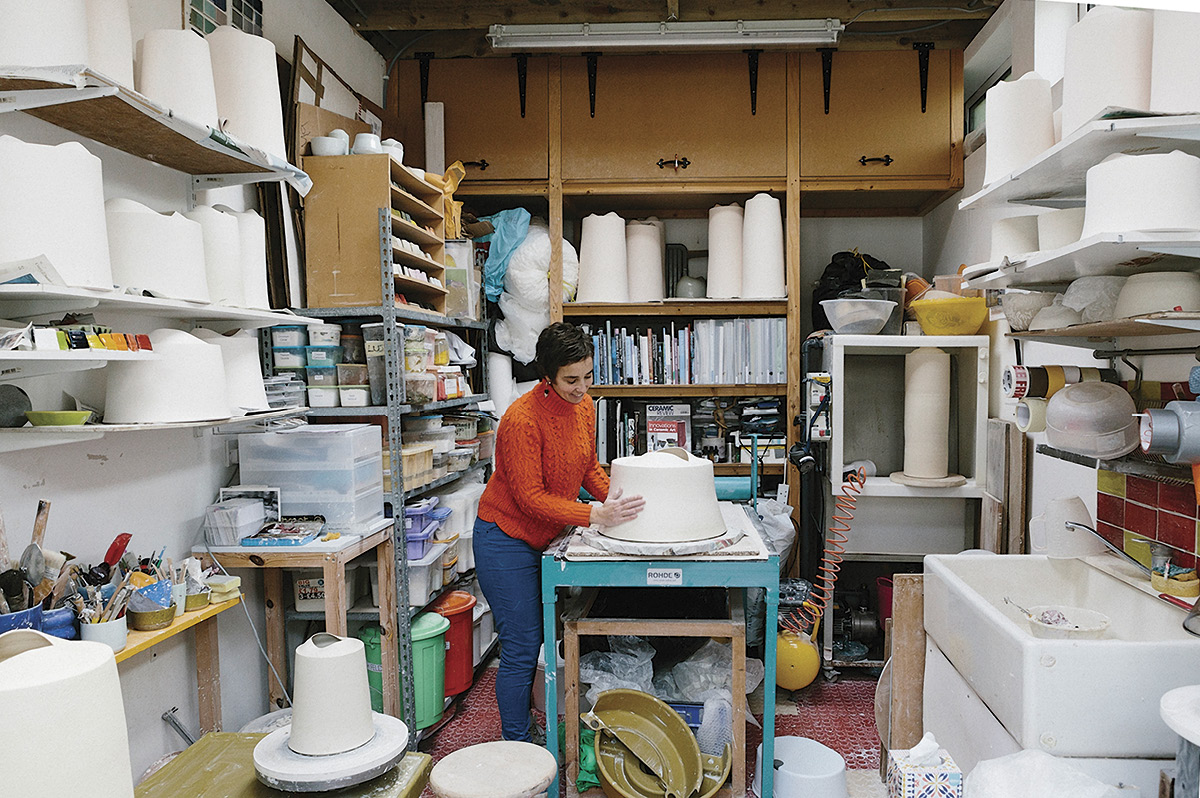 1 Tanya Gomez working on larger vessel inside studio. Photo: Sarah Weald.